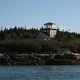 A lighthouse of a cool looking house.