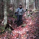 Kim on the foliage covered trail.