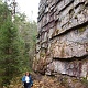 Kim along the wall.