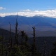 An awesome outlook near the summit of Waumbek, witht the views of Presidential ridge in the distance.
