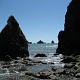 A bundant sea stacks pierced out from the ocean.