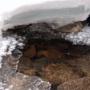 Layers of snow, blue ice, snowflakes and thin ice.