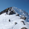 Toby heading up the false summit.
